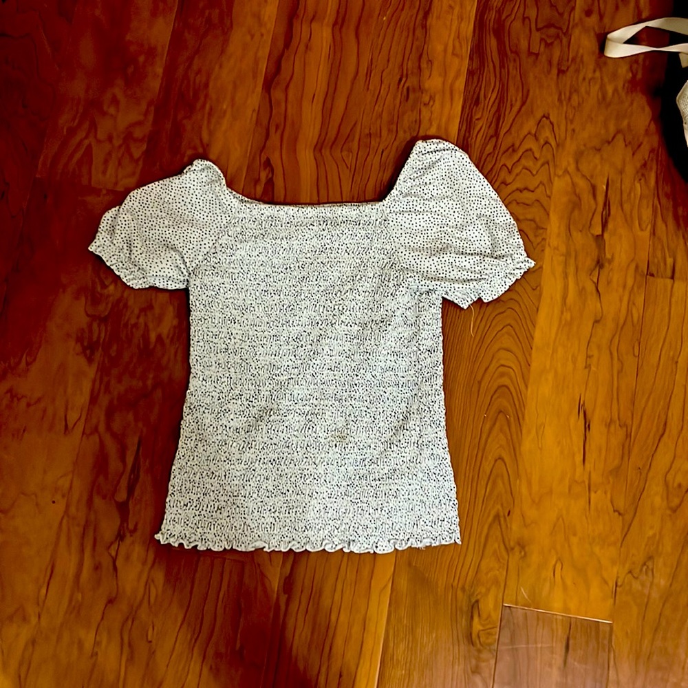 Super cute casual little stain but can be removed with purchase